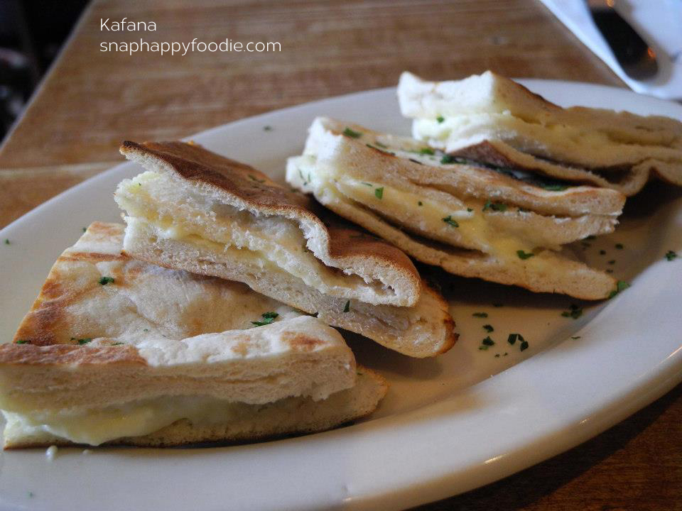 Lepinja sa Kajmakom - traditional bread served warm with creamy spread (I think!)